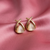 Gold-Tone Triangle Stud Earrings with Cream Stone