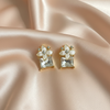 Floral Crystal Drop Earrings – Elegant Gold Finish Statement Design