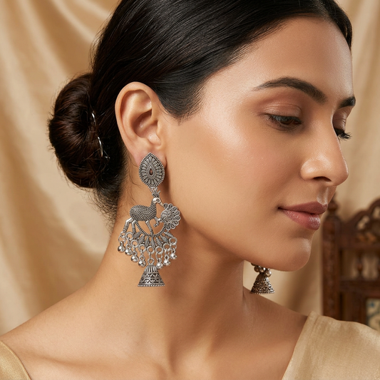 Oxidised Silver Deer Motif Jhumka Earrings with Intricate Tribal Design
