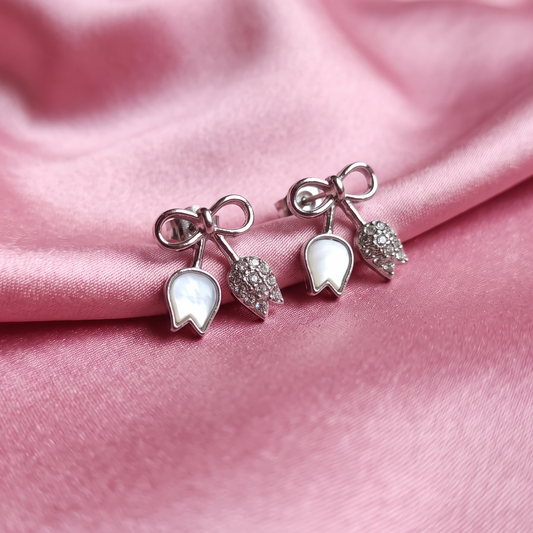 Elegant Silver-Tone Bow Earrings with Crystal & White Leaf Charms