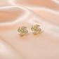 Gold Spiral Crystal Stud Earrings – Statement Swirl Design