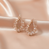 Blush Crystal Teardrop Hoop Earrings with Gold Detailing