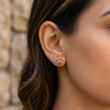 Premium Knot Design CZ Stud Earrings with Ruby Accents – Gold Finish-American Diamond