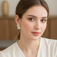 Floral Crystal Drop Earrings – Elegant Gold Finish Statement Design