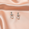 Silver Crystal Bow Pearl Earrings – Elegant Minimal Statement