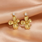 Gold Flower Drop Earrings with Crystal Stud – Statement Floral Earrings