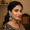 Oxidised Silver Floral Disc Jhumka Earrings with Traditional Detailing-Stainless steel