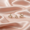 Floral Pearl & Crystal Statement Earrings – Elegant Gold Finish