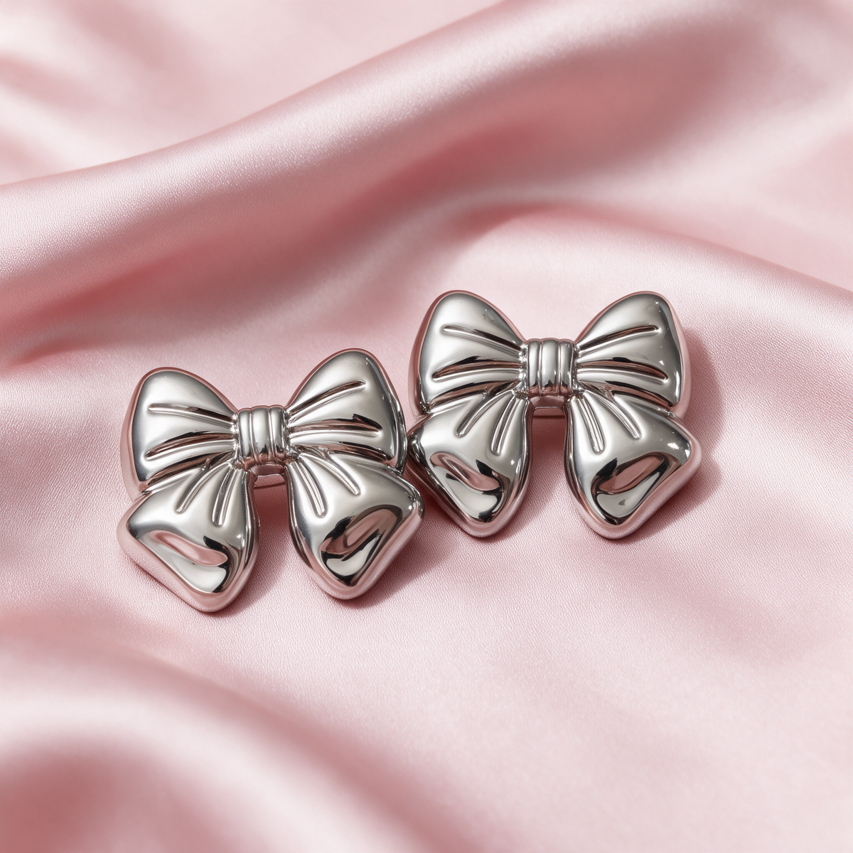 Silver Bow Statement Earrings