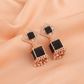 Rose Gold Black Square Jhumka Earrings