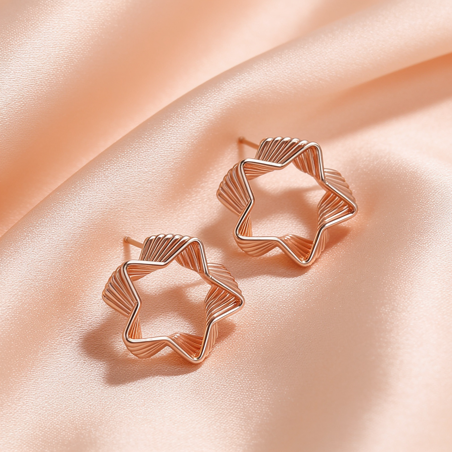 Rose Gold Star Spiral Stud Earrings